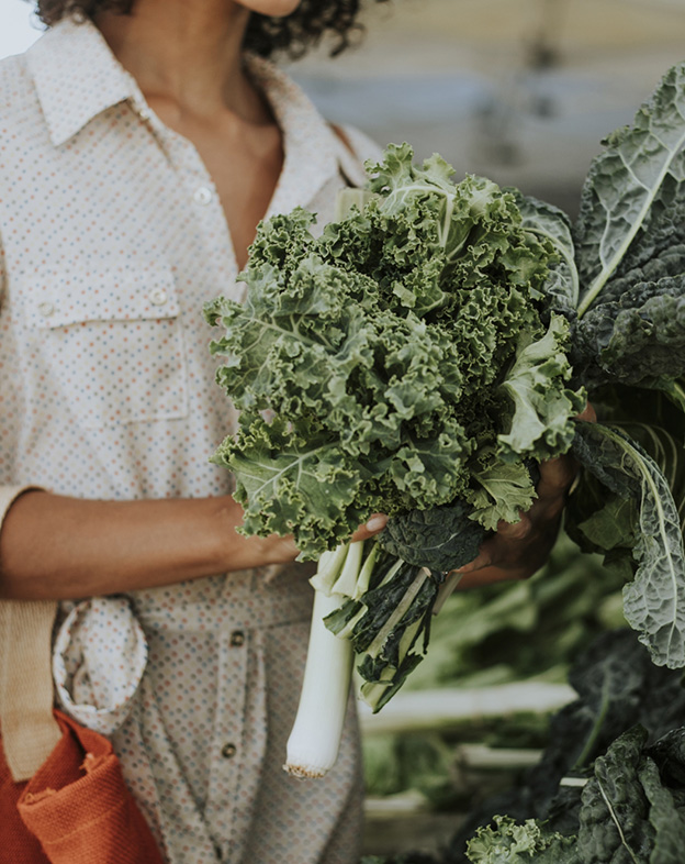 woman holding produce